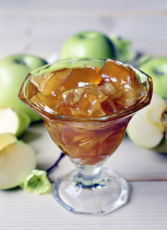 Beautiful fresh apple jam in a glass on the table.の写真素材