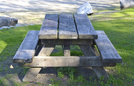 Wooden picnic table in the park walking holidaysの写真素材