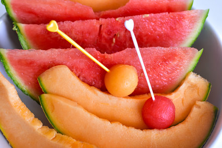 Watermelon melon on toothpicks canapes fresh fruitの写真素材