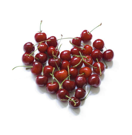 Cherries in the form of heartの写真素材