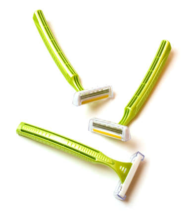 Three shavers isolated on white backgroundの写真素材