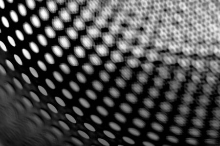 Abstract surface with round holes in black and white. Black and white minimalism.の写真素材
