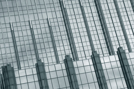 Modern building facade with shiny exterior. Futuristic building.