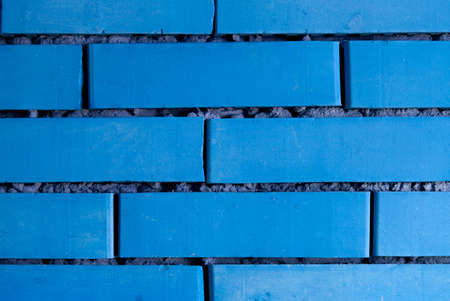 Brick wall background in abstract blue. Blue wall texture.の写真素材