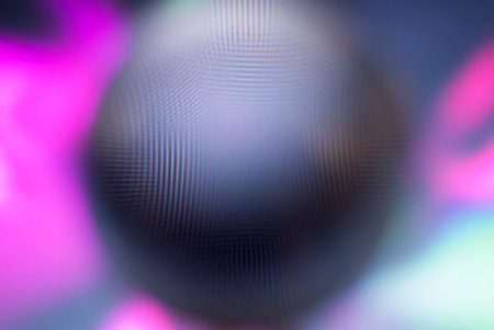A real photo of an abstract blurry object. An abstract blurry silhouette of a round object.