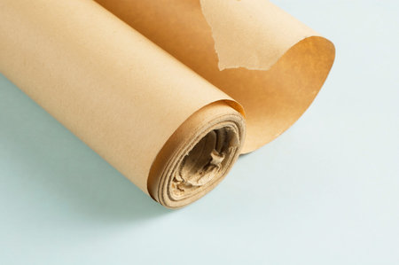 A roll of old paper on blue backgroundの写真素材