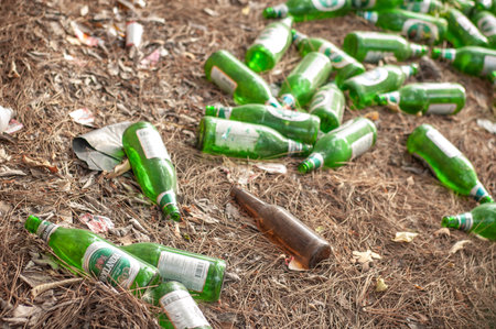 Rustavi, Georgia. May 30, 2021. Scattered beer bottles on the ground.のeditorial素材