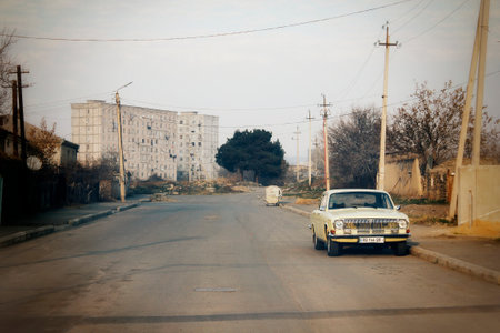 Rustavi, Georgia. December 11, 2021. Soviet car Volga Gaz 24 parked by the road.のeditorial素材
