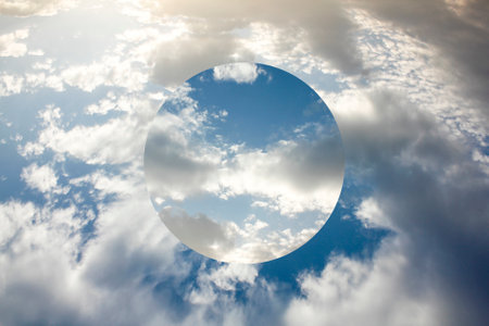 Beautiful clouds in the sky with an illusionary sphere.の写真素材
