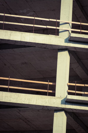 Unfinished concrete structure under the bright sunlight.
