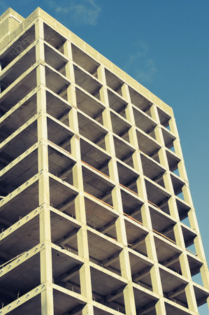 Modern unfinished multistory building. Higher building view.