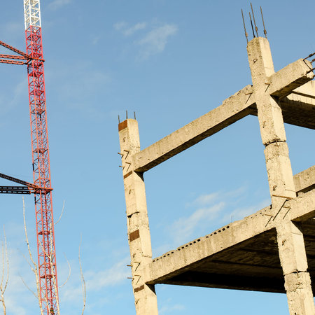 Modern building process. Unfinished residential building.