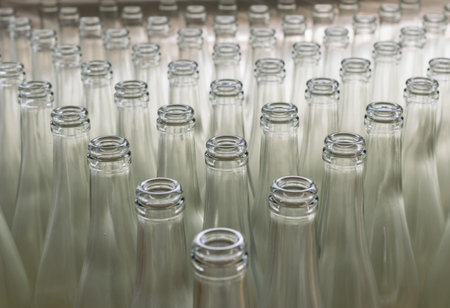 pile of empty transparent glass bottlesの写真素材