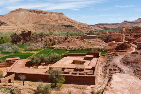Traditional berber clay settlement in Sahara desert, Moroccoの写真素材