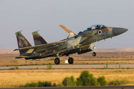 Israeli Air Force F-15I Raam jet with bombs flying during an airshow at Hatzerim, close to Beersheva Israelの写真素材
