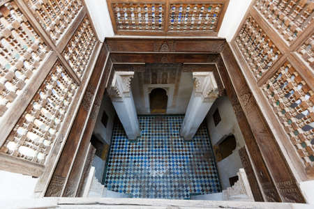 Traditional arabic Colorful Ancient style mosaic in interior elements. Abstract geometry, carved vintage pattern in Marrakesh, Morocco, Africaの写真素材