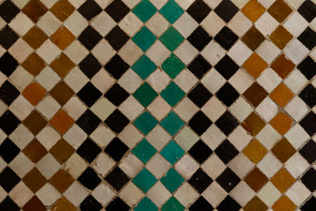 Traditional arabic Colorful Ancient style mosaic in interior elements. Abstract geometry, carved vintage pattern in Marrakesh, Morocco, Africaの写真素材
