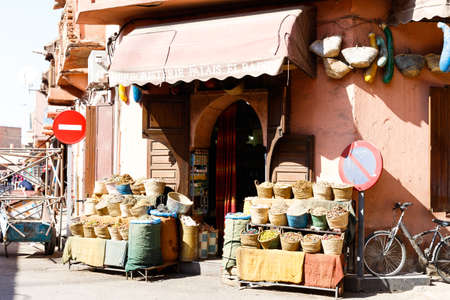 Colorful cooking Spices and flower in traditional local medina bazaar market in Marrakesh, Moroccoのeditorial素材