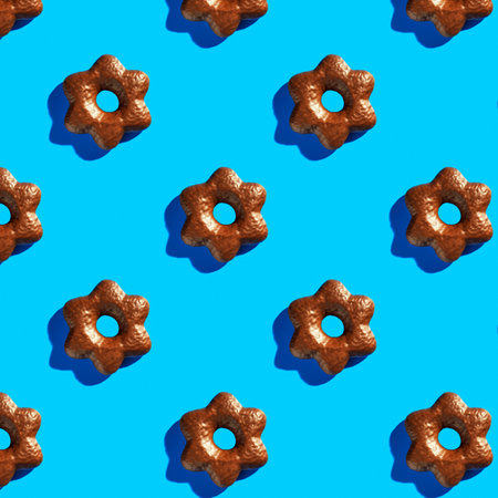 Christmas chocolate gingerbread on a blue background, laid out in a row .の写真素材