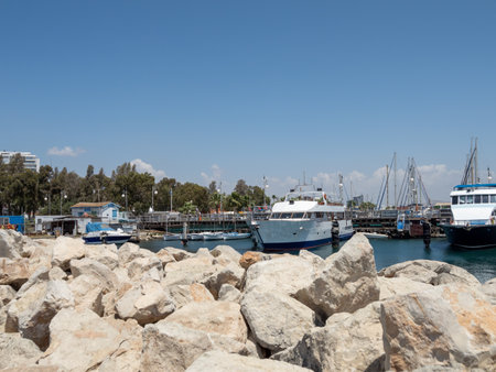 Ships on the dock with rocks in the foreground. High quality photoの写真素材