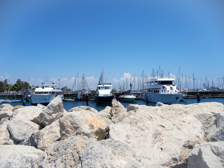 Ships on the dock with rocks in the foreground. High quality photoの写真素材