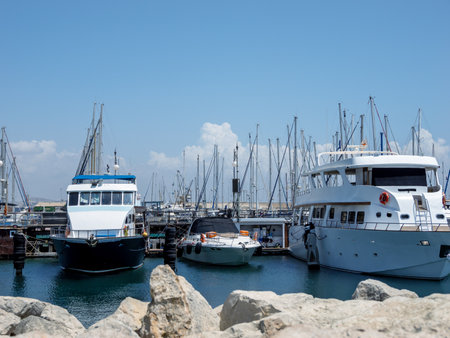Ships on the dock with rocks in the foreground. High quality photoの写真素材