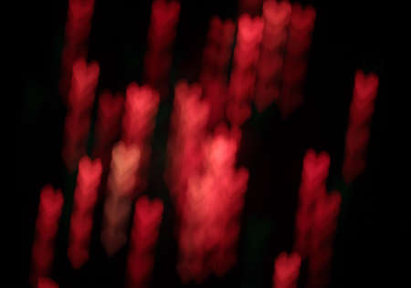 background with blurred outlines of a plurality of flying heartsの写真素材