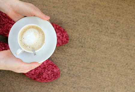 cup of coffee with a delicate milk foamの写真素材