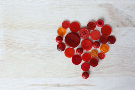 heart symbol from red buttons multiplitsityの写真素材