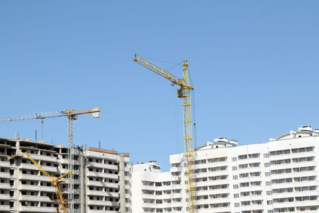 a lot of different cranes during the construction of buildings