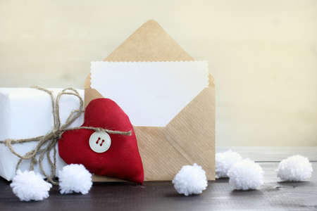heart with a gift card for greetings / favorite holidayの写真素材