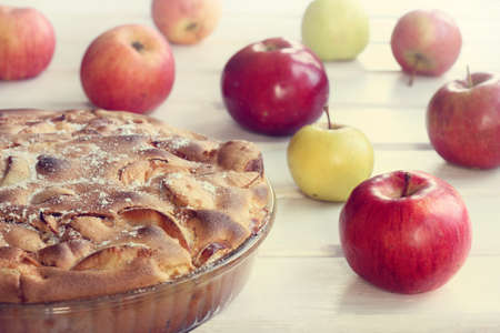 Fruit Tart and fresh apples on a light table / holiday Thanksgivingの写真素材