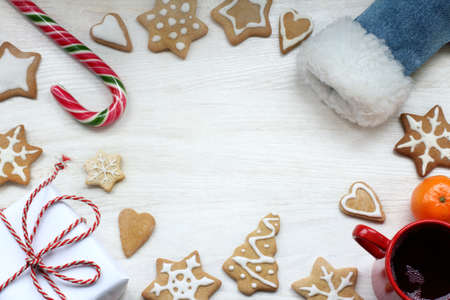 flat layout of festive items on the table top view / many surprises from the boot santaの写真素材