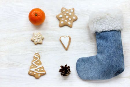 flat layout different holiday items on a light wood table / riddle about the new yearの写真素材