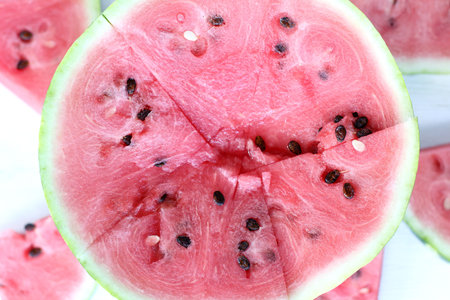 Half of watermelon slices on a background of a top view / favorite dessert and table decoration