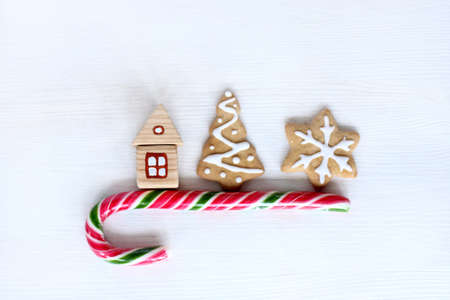 concept of domestic winter holiday, candy, cookies and Christmas tree / magic items for the unique atmosphereの写真素材