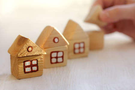 concept small individual houses in various stages of completion / assistance in constructionの写真素材