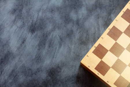 old wooden chess board on a measured coated surface top view / game truce