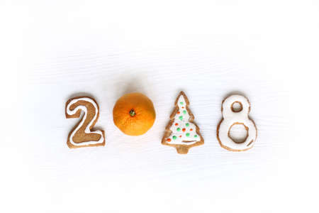 installation with figured ginger biscuits and mandarin / Christmas concept 2018の写真素材