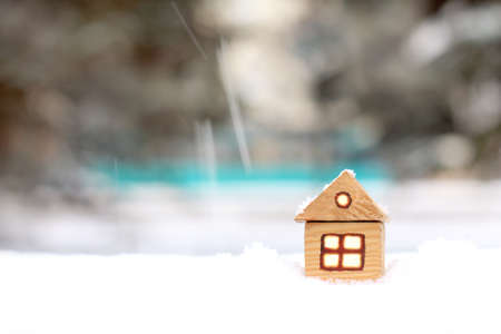 layout of an individual apartment house from tree in snowy winter / accommodation in a warm cozy homeの写真素材