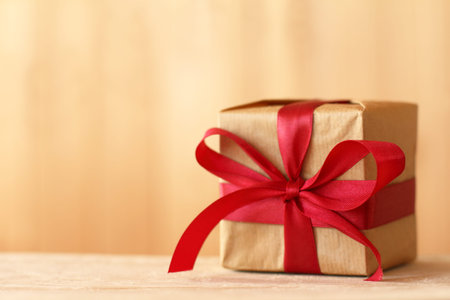 Gift with red ribbon and bow. surprise for the holiday