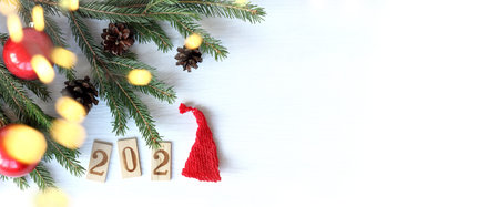round dance of cones in colored caps around the number 2021.two zero two ginger tree
