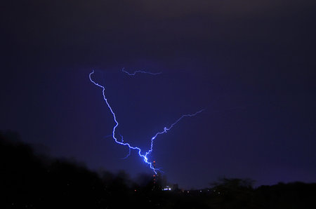 lightning strike beating in a tower