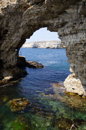rock arch at the seaの写真素材