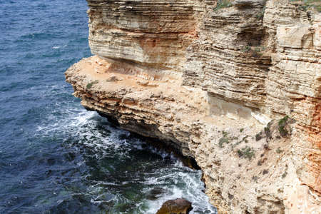 rocky cliff and beautiful blue seaの写真素材
