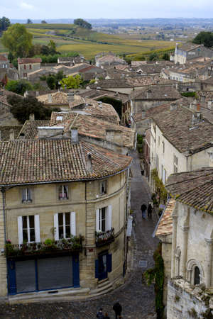 roofs of buildings of saint-emilion at overcast dayの写真素材