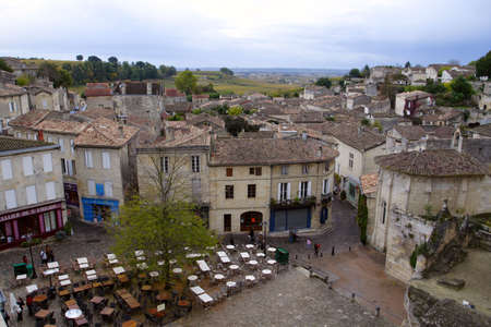 roofs of buildings of saint-emilion at overcast dayの写真素材