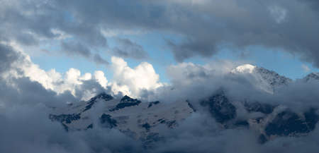 mountains through cloudsの写真素材