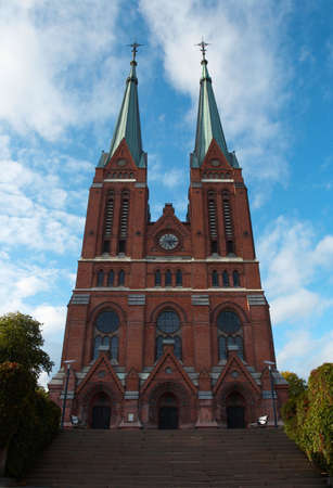 traditional norwegian church with blue cloudy sky  in the background, norway の写真素材