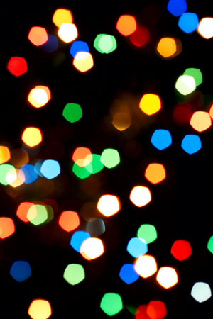 abstract background made of defocused multicolored pentagon of light